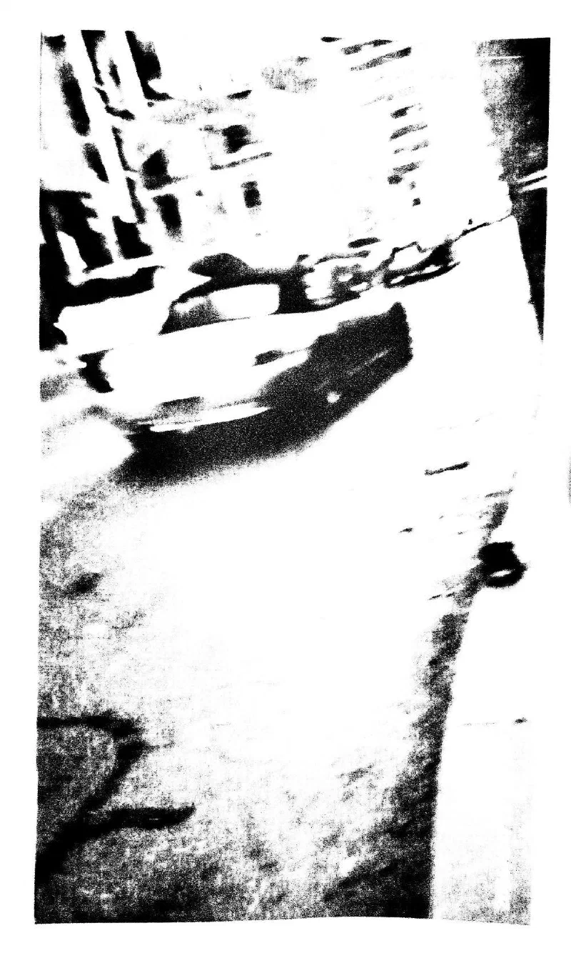 A car passing in a blur.
