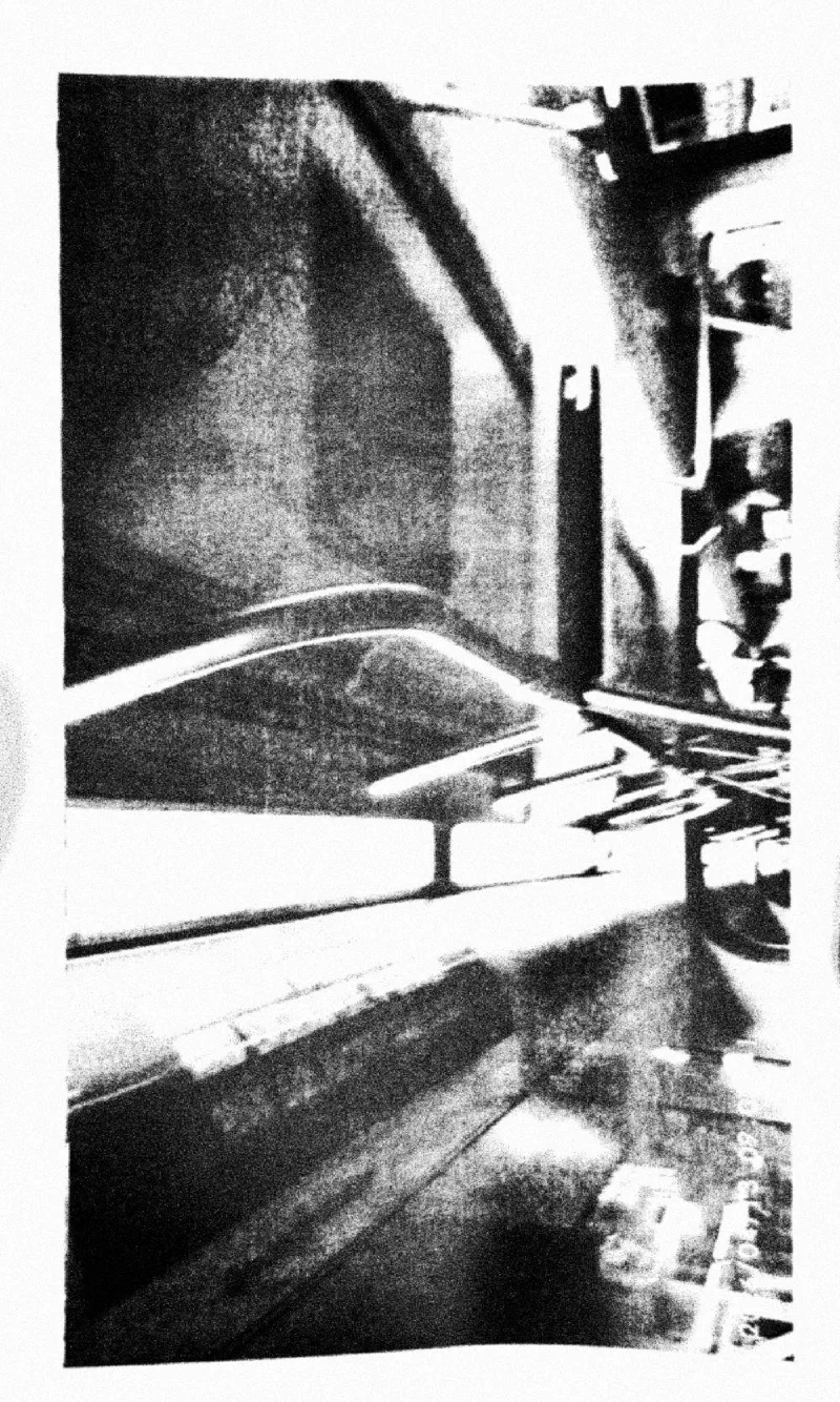 Handrails and ceiling inside a transit vehicle, 13 April 2026.