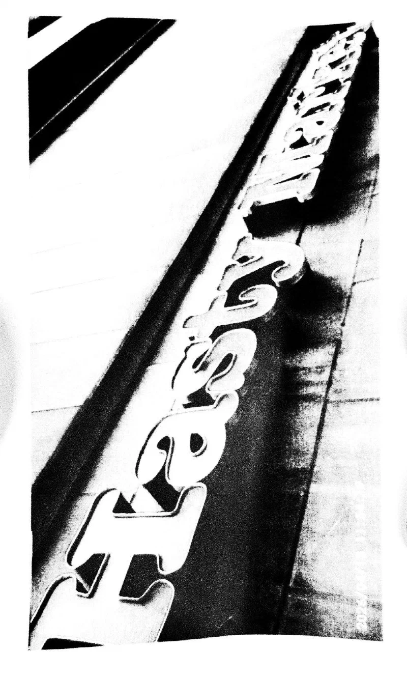 The Hasty Market sign above a storefront.