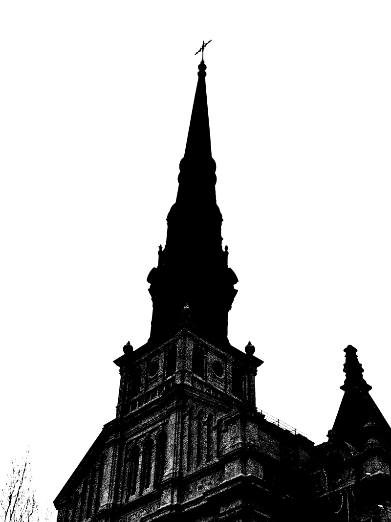 A church spire in silhouette, May 2026.