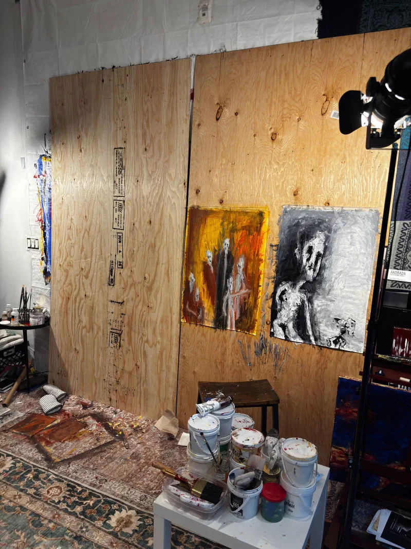 Elders Responsibility and Petals of the Past (both 2026) on the plywood wall of the studio, July 2026.